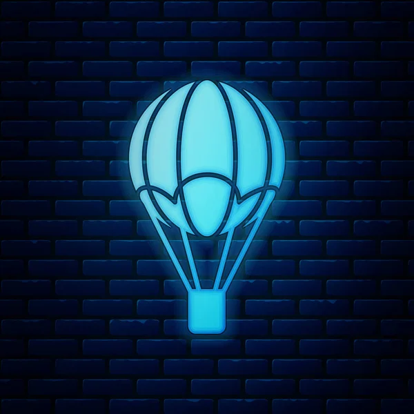 Gloeiende neon hete lucht ballon pictogram geïsoleerd op bakstenen muur achtergrond. Vervoer door de lucht voor reizen. Vectorillustratie — Stockvector