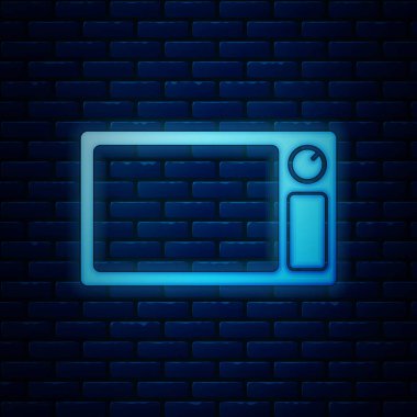 Parlayan neon mikrodalga fırın ikonu tuğla duvar arka planında izole edilmiş. Ev aletleri simgesi. Vektör İllüstrasyonu