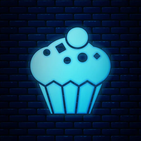 Leuchtende Neon-Muffin-Symbol isoliert auf Backsteinwand Hintergrund. Vektorillustration — Stockvektor