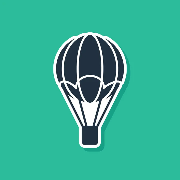 Blue Hot air balloon icon isolated on green background. Air transport for travel. Vector Illustration