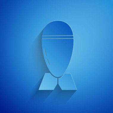 Kağıt kesiği Havacılık bomba ikonu mavi arka planda izole edildi. Roket bombası düşüyor. Kağıt sanatı tarzı. Vektör İllüstrasyonu