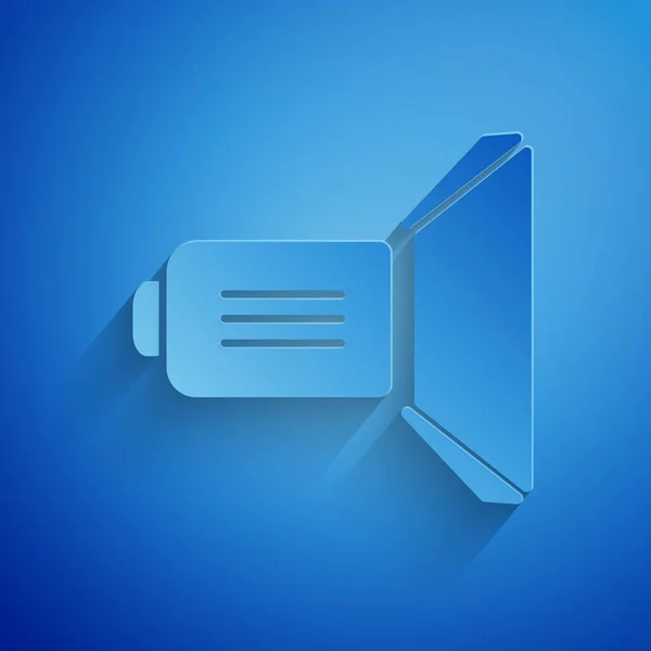 Paper cut Movie spotlight icon isolated on blue background. Light Effect. Scene, Studio, Show. Paper art style. Vector Illustration — Stock Vector
