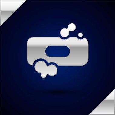 Koyu mavi arkaplanda izole edilmiş gümüş renkli sabun simgesi. Köpüklü sabun çubuğu. Vektör İllüstrasyonu