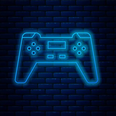 Parlayan neon hattı Gamepad simgesi tuğla duvar arka planında izole edildi. Oyun kontrolörü. Vektör İllüstrasyonu.