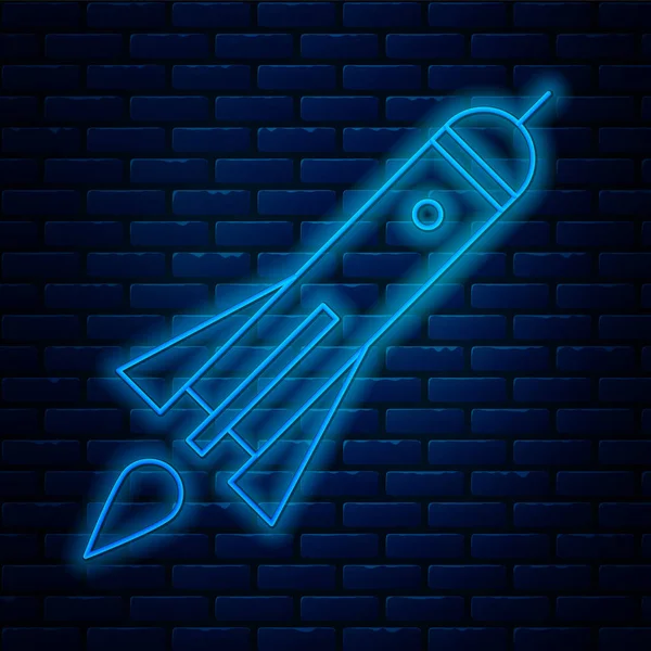Glowing Neon Line Rocket Ship Fire Icon Isolated Brick Wall — Stock Vector