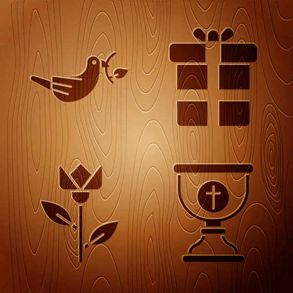 设置基督教圣杯 和平鸽与橄榄枝 花郁金香和礼物盒木制背景 — 图库矢量图片