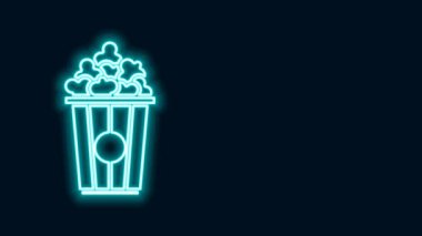 Siyah arka planda izole edilmiş karton kutuda parlayan neon çizgi patlamış mısır. Patlamış mısır kutusu. 4K Video hareketli grafik canlandırması