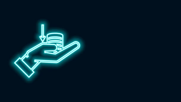 Glowing neon line Money on hand icon isolated on black background. Palm holds cash with down. Cash salary decrease. 4K Video motion graphic animation — Stock Video