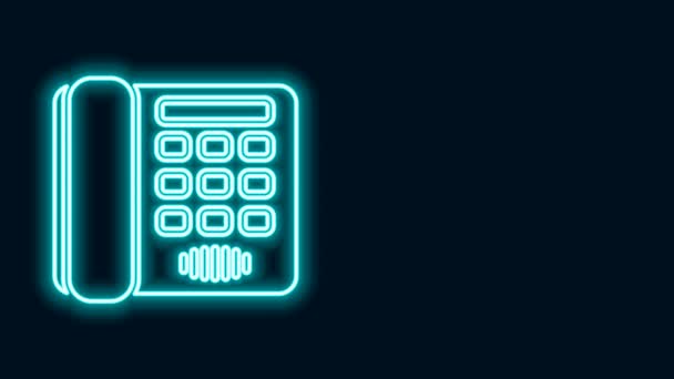 Gloeiende neon lijn Telefoon pictogram geïsoleerd op zwarte achtergrond. Vaste telefoon. 4K Video motion grafische animatie — Stockvideo
