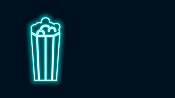 Gloeiende neon lijn Popcorn in kartonnen doos pictogram geïsoleerd op zwarte achtergrond. Popcorn emmer doos. 4K Video motion grafische animatie — Stockvideo
