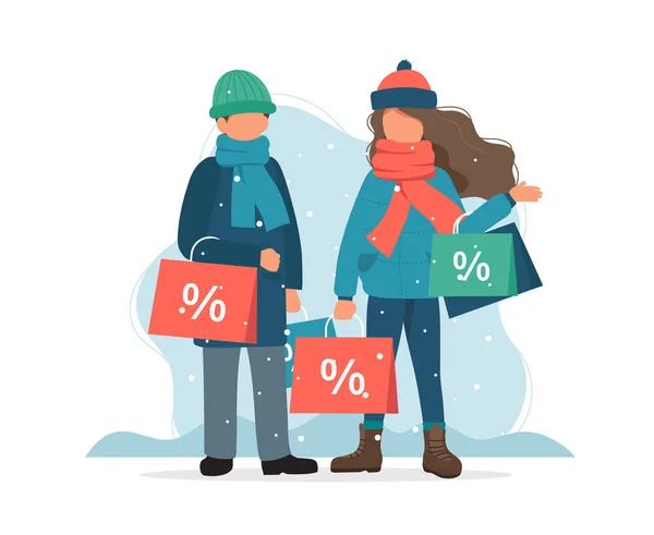 Winterverkoop, man en vrouw met boodschappentassen in de winter. Vector illustratie in platte stijl — Stockvector