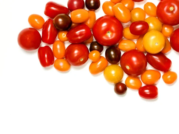 Ripe garden-fresh heirloom tomatoes on white — Stock Photo, Image