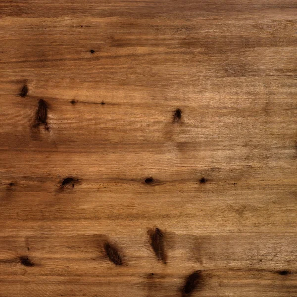 Fond rustique en bois brun chaud avec nœuds et grain — Photo