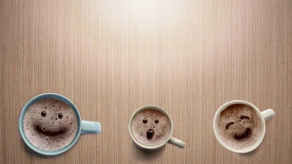 Three different faces coffee cup on a wooden table. — Stock Photo, Image