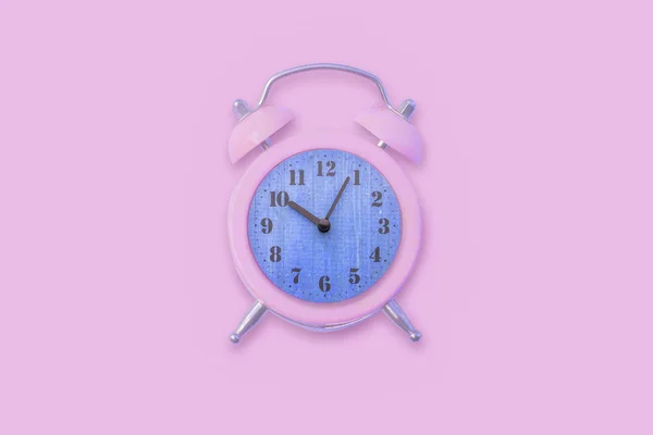 Pastel pink retro alarm clock — Stock fotografie