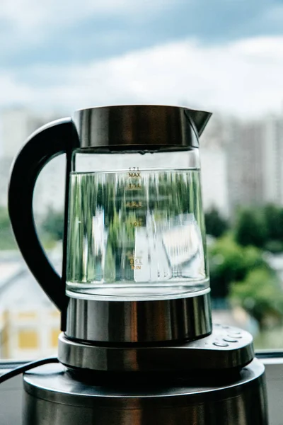 boiling water in glass kettle