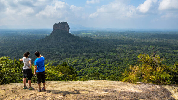 Sigiriya rock, view from Pidurangala Rock. Sri Lanka. Sigiriya or Sinhagiri is an ancient rock fortress located in the northern Matale District near the town of Dambulla in the Central Province, Sri Lanka. 