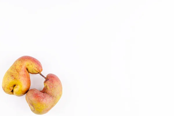 Ugly fruits organic ripe pears on white background, zero waste food concept — Stock Photo, Image