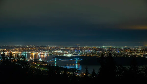 Vancouver cityscape at night from the Cypress view point.  Vancouver BC Canada