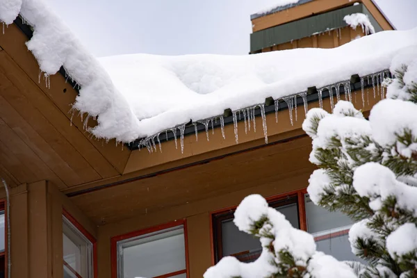 A picture of snow on the roof.    Whistler BC Canada