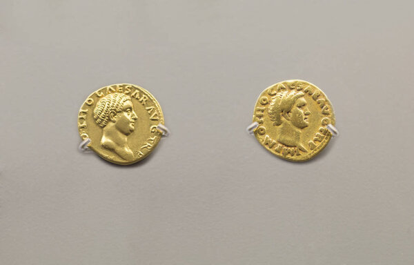 Merida, Spain - December 20th, 2017: Two gold coins of Otho Roman Emperor at National Museum of Roman Art in Merida, Spain