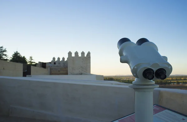 Turistic telescope at Alcazaba of Badajoz, an ancient Moorish citadel, Extremadura, Spain. Sunset