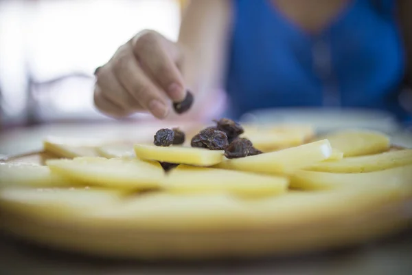 Woman Taking Sweet Raisin Center Cured Cheese Plate Selective Focus — Stock Photo, Image