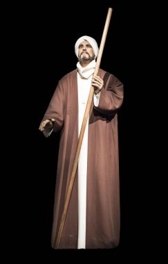 Cordoba, Spain - 2018, Sept 8th: Life-sized sculpture of Ibn Arabi, Andalusian Muslim scholar, mystic, poet, and philosopher. Calahorra Tower Museum, Cordoba, Spain clipart