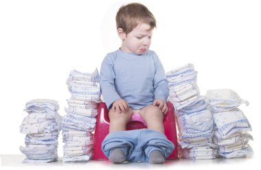 O kullanarak durdurmak gerekir çünkü çömleği üzerinde oturan üzgün bebek çocuk bezi. Lazımlık eğitimi kavramı