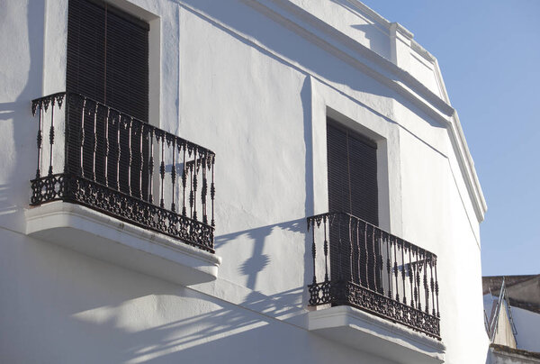 Southwest Spain traditional whitewashed balconies. Jerez de los Caballeros, Extremadura, Spain