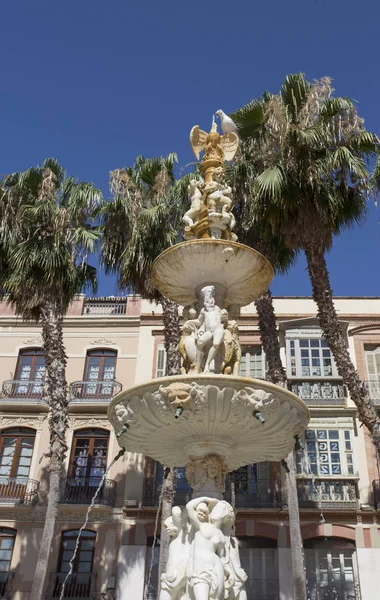 Monumental Fountain vid Constitucion Square, Malaga Spanien Stockbild