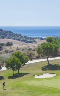 Costa del Sol resort, İspanya'da genç erkek golf oyuncusu