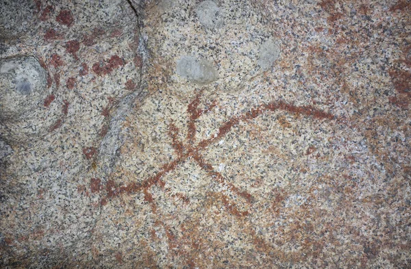 Dipinti schematici preistorici all'interno del masso di granito a Natura — Foto Stock