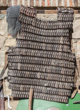 Lamellar armour used by moorish army during Reconquest period. It is made hardened leather of pig clipart