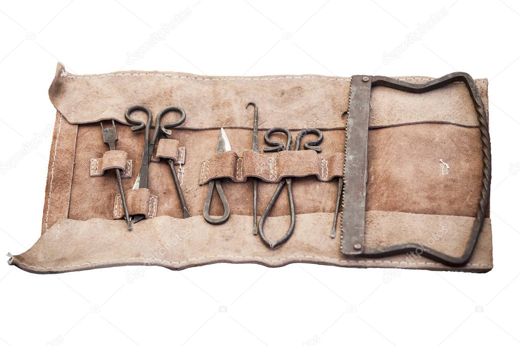 Medieval surgery doctors tools in leather wrap