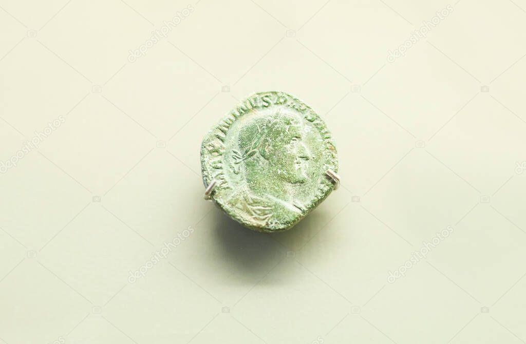 Merida, Spain - August 25th, 2018: Roman Emperor Maximinus Thrax bronze coin. National Museum of Roman Art in Merida, Spain
