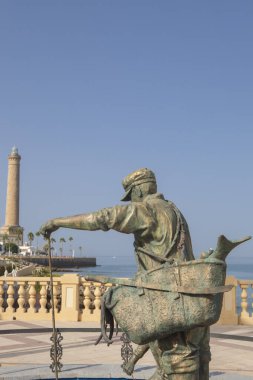 Chipiona, Spain - August 16h, 2025: Corrales de pesca fisher sculpture. JD Blanco sculpter, 2022