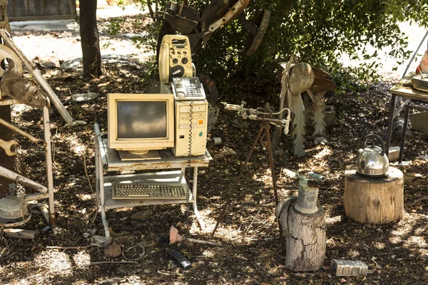 Old things-computer, telephone, radio, gasoline burner, kettle