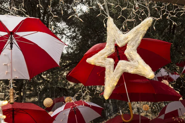 Star Luminous Lights Background Umbrellas Hanging Tree Branches — Stock Photo, Image