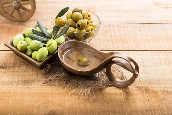 Pitted Green Olives Oil Wooden Table — Stock Photo, Image