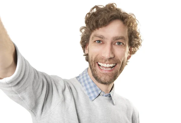 Joven Riendo Hace Selfi Sobre Fondo Blanco —  Fotos de Stock