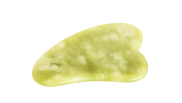 Yeşilin doğal taşından yapılmış Gua sha aracı.