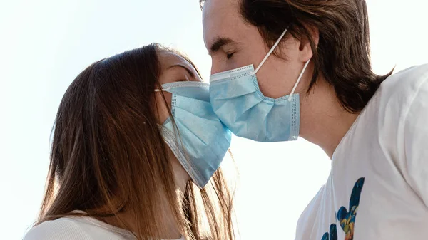 Young Man Woman Kissing Surgical Face Masks Quarantine Covid Protection — Stock Photo, Image