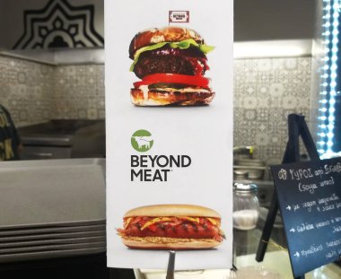 Thessaloniki, Greece - 07.18.2020 : Sign with Beyond Meat burgers in the fast food corner. clipart