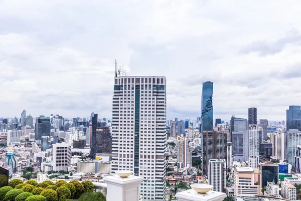 The image of the building and city of prosperity in business and tourism in Asia is viewed from a high angle.