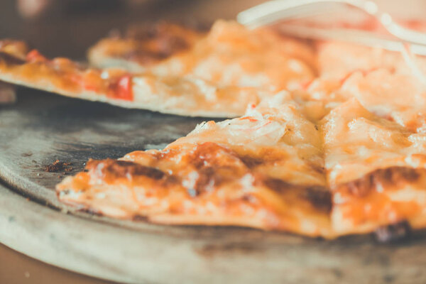Italian Pizza Margherita (Margarita) with tomatoes and mozzarella cheese is used as an illustration of the culinary.