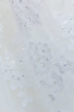 Bir bileşeni olarak gelin kıyafeti düğün töreni için kullanılan güzel nakış deseni.