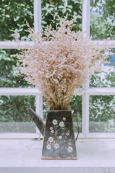 Dried flowers in vases for home decoration.