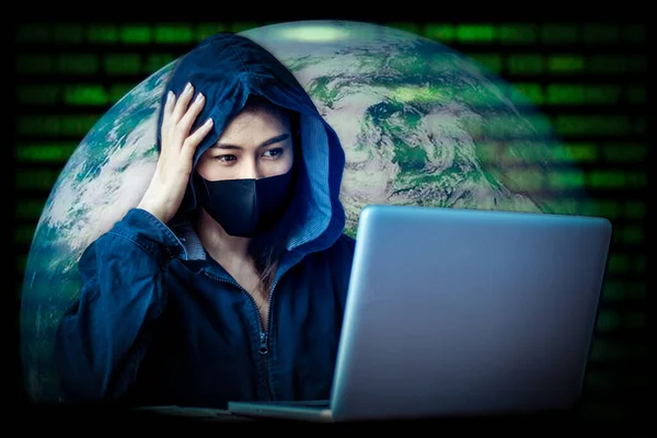 Professional hacker women Stealing data from online computer systems By releasing viruses into the system By using laptops the concept of malware and hacker Elements of this image furnished by NASA