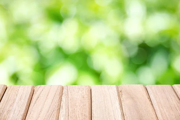 Surface Wooden Table Isolated Green Light Abstract Blur Bokeh Leaves — Stock Photo, Image